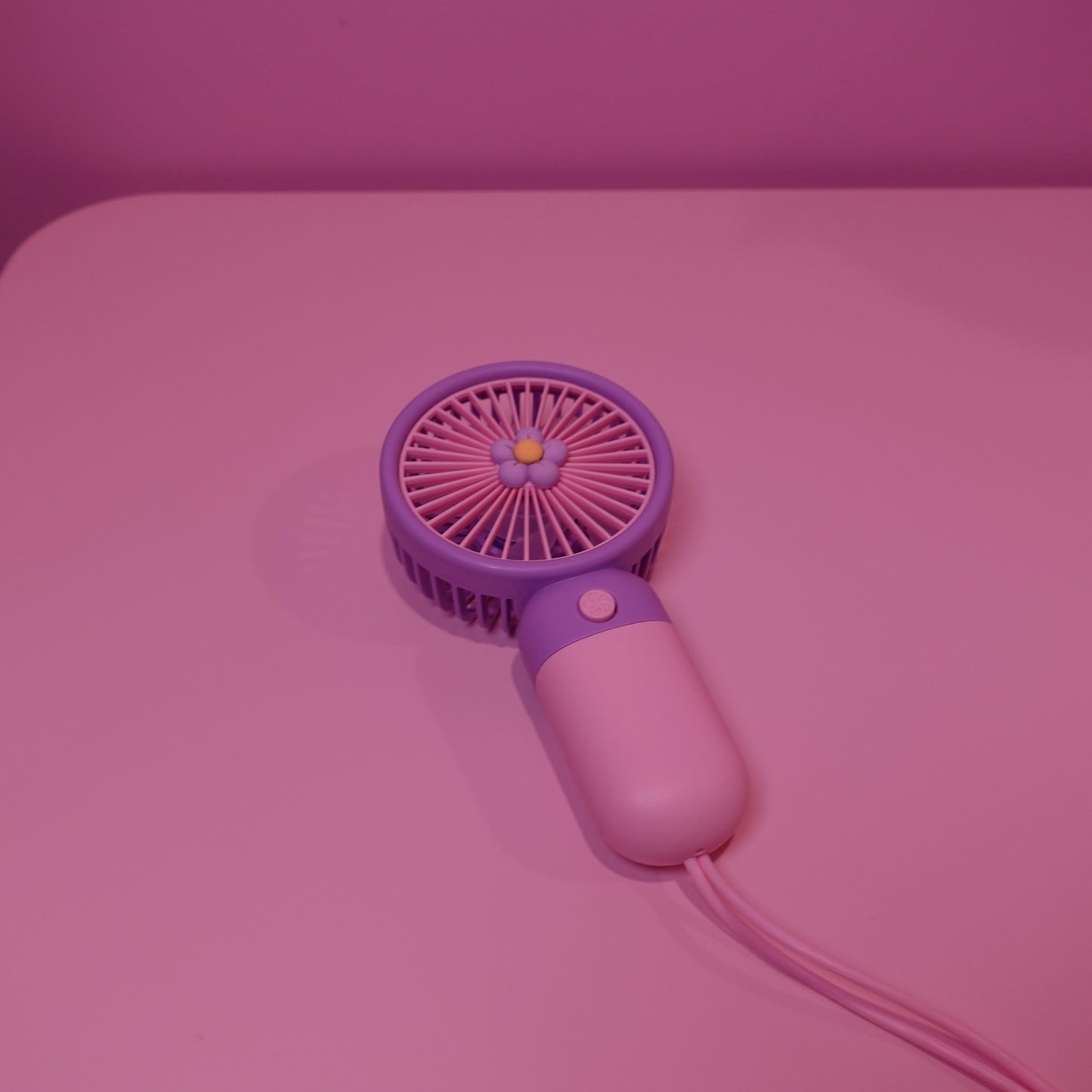 Fan with strap